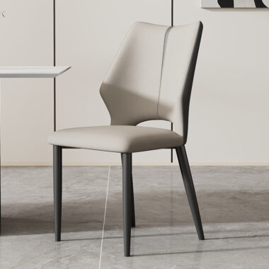 Minimalist Italian-style upholstered dining chair with soft backrestThis soft cushioned dining chair features Italian-inspired curves, fabric upholstery, and sleek metal legs, offering a blend of luxury and comfort for restaurants, cafes, and living spaces.