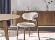 Nordic solid wood dining chair with cotton linen fabric and ergonomic horn-shaped backrest